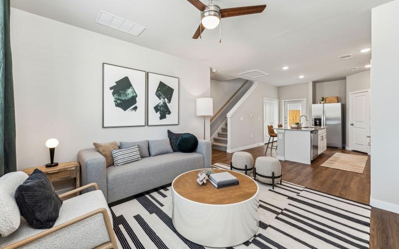 a living room with a couch and a table